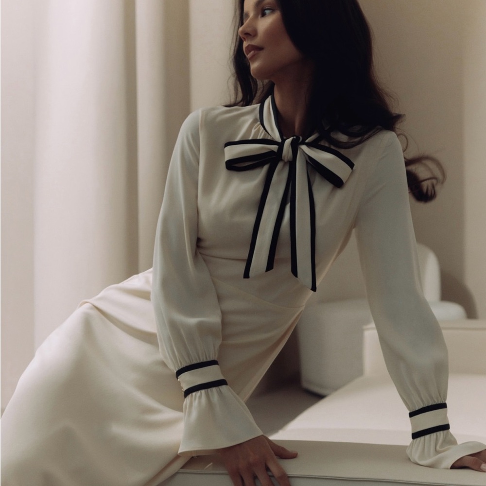 Elegant Cream Midi Dress with Black Accents